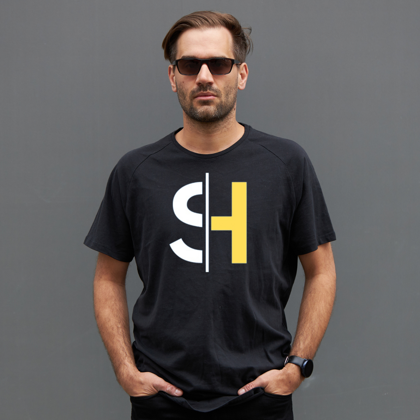 Unisex Black short sleeve T-shirt with Shad Hartley logo